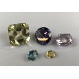 A quantity of unmounted gemstones.