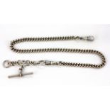 A hallmarked silver Albert chain and T bar, L. 40cm.