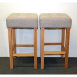 A pair of contemporary bar stools.