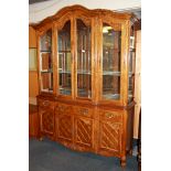 A large matching display cabinet, W. 155cm H. 205cm.