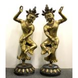 A pair of impressive Sino-Tibetan gilt bronze temple dancers, H. 85cm.