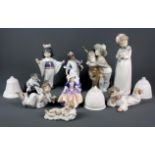 A group of Lladro figures and bells together with a further Spanish figure (girl holding baby) and a