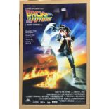 A framed 'Back to the Future' cinema advertising poster, framed size 66 x 97cm.