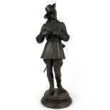 A 19th Century French spelter figure of a musketeer, H. 46cm.