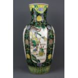 A 19th Century Chinese hand enamelled porcelain vase with famille noire decoration, H. 41cm.