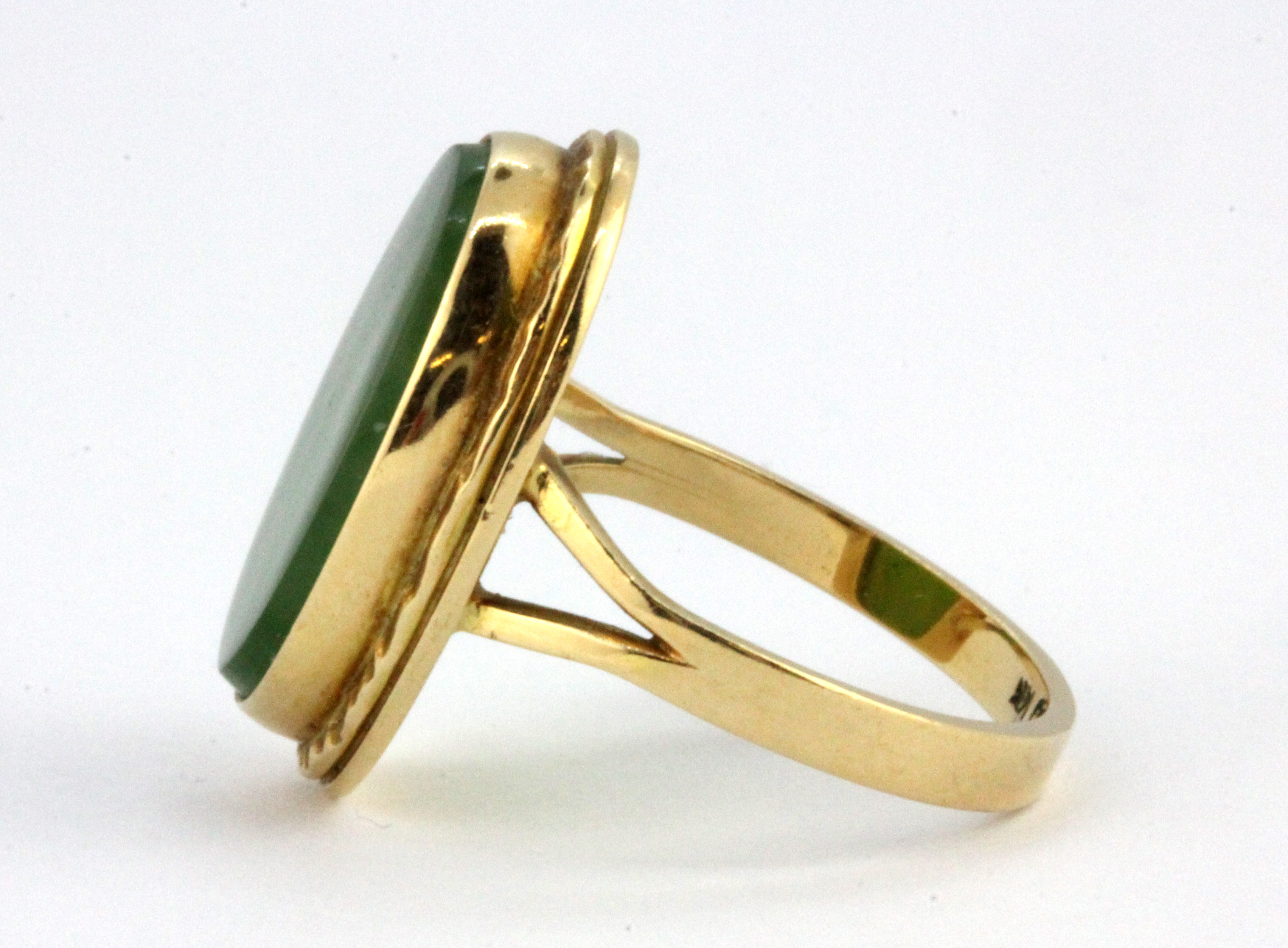 A 14ct yellow gold (stamped 14k) jade set ring, (N.5). - Image 2 of 2