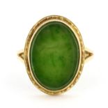 A 14ct yellow gold (stamped 14k) jade set ring, (N.5).