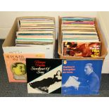 Two boxes of approximately 200 mixed LP records including jazz.