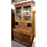 A Victorian carved mahogany bureau bookcase, size 235 x 112 x 41cm.