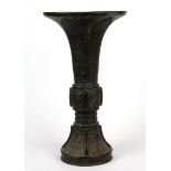 A Chinese Ming Dynasty cast bronze vase with flared neck, H. 22cm.