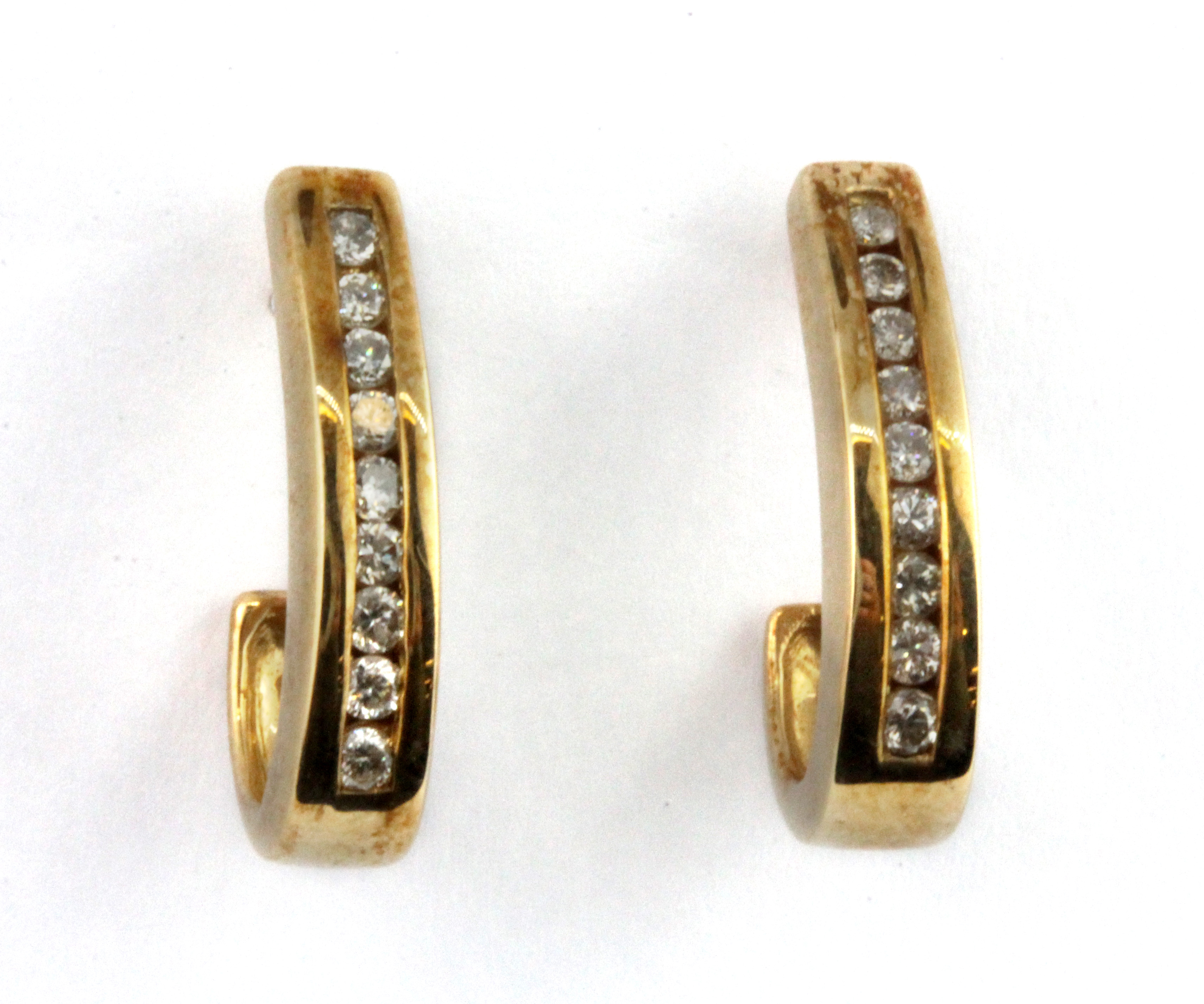 A pair of 9ct yellow gold diamond channel set earrings, L. 1.7cm.