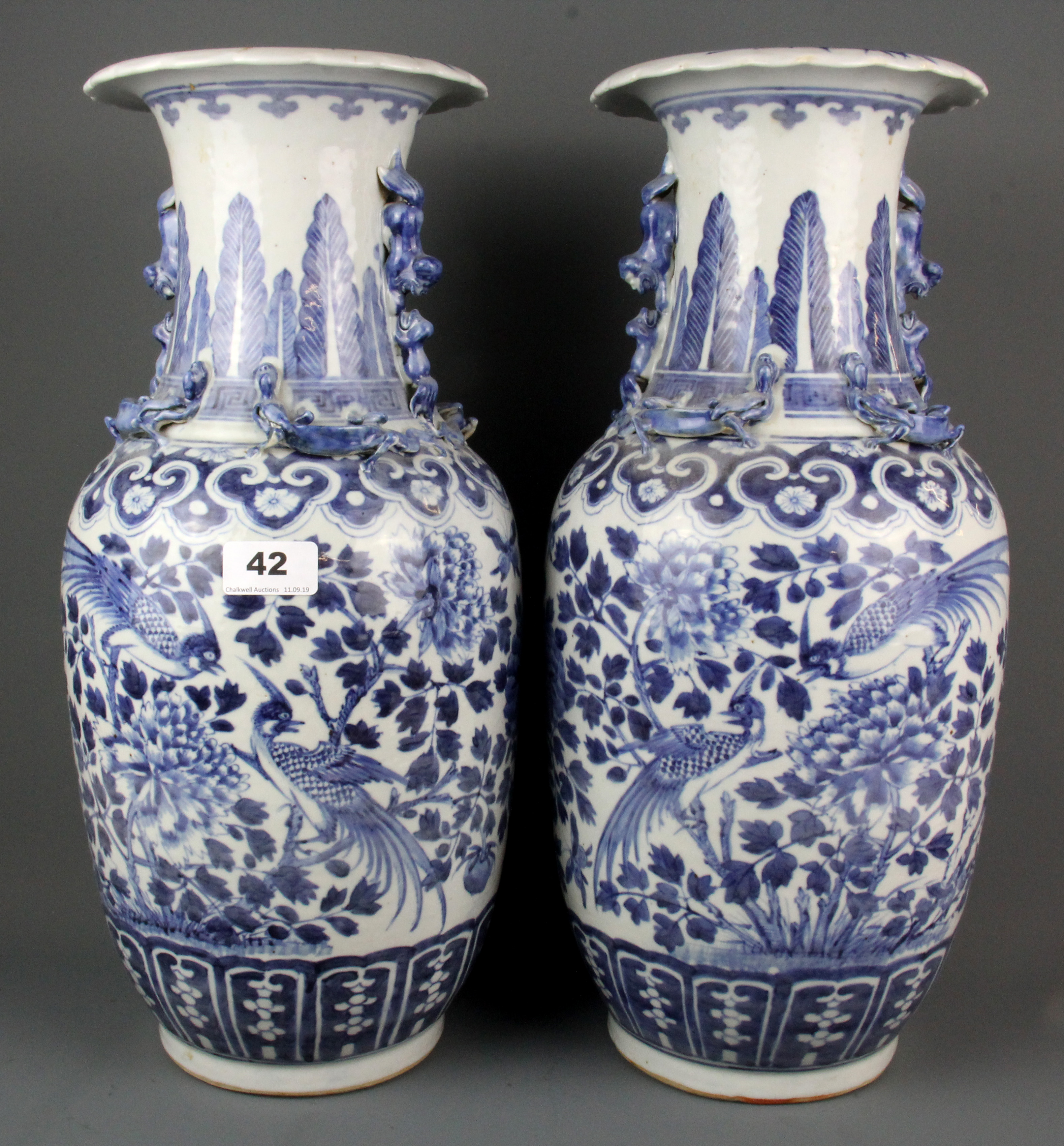 A pair of 19th Century Chinese hand painted porcelain vases, H. 46cm.