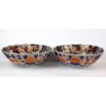 A pair of fine early 19th Century Japanese Imari lotus flower shaped bowls, Dia. 34cm.