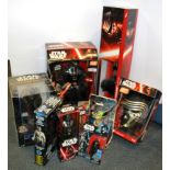 A group of boxed Star Wars collector's figures.