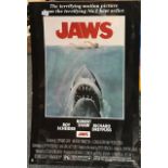 A mounted Jaws cinema advertising poster, size 61 x 92cm.