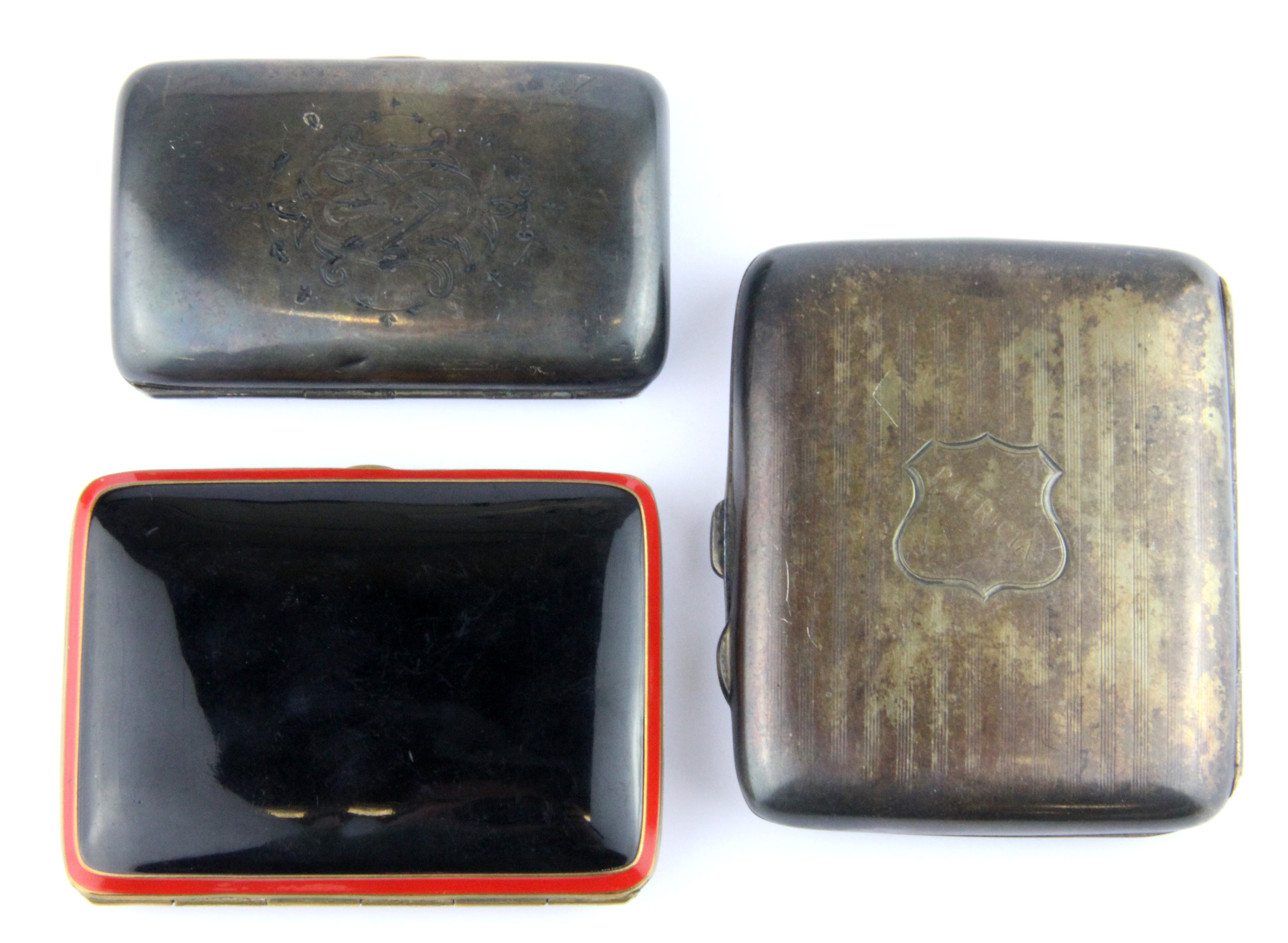 Two hallmarked silver cigarette cases and an enamelled gilt metal cigarette case.