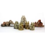 A group of seven Chinese carved soapstone monkeys, tallest H. 11cm.