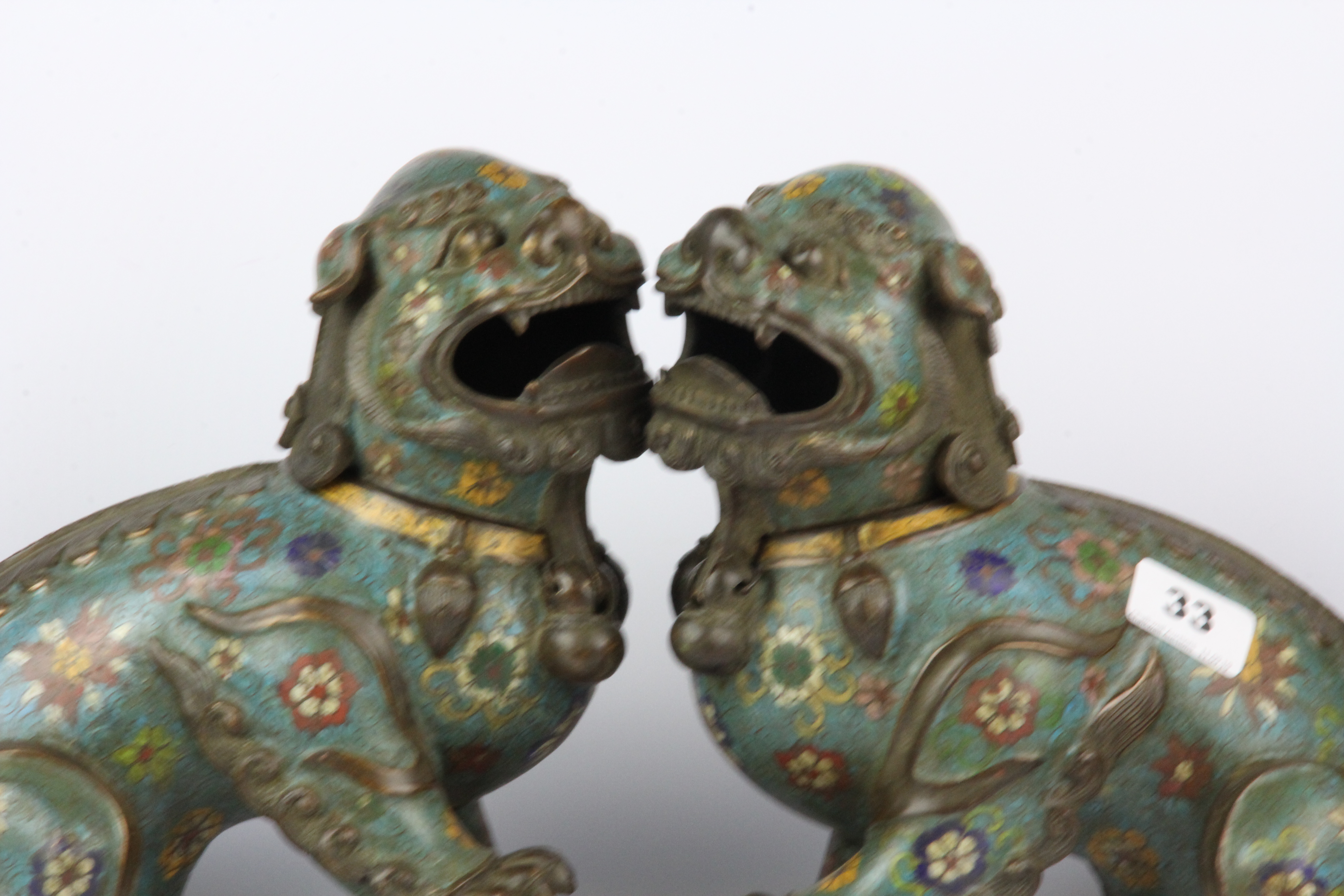 A pair of Chinese cloisonne enamel on bronze lion dog figures, H. 27cm. - Image 2 of 3
