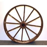 An antique wide rim iron wheel, Dia. 61cm.