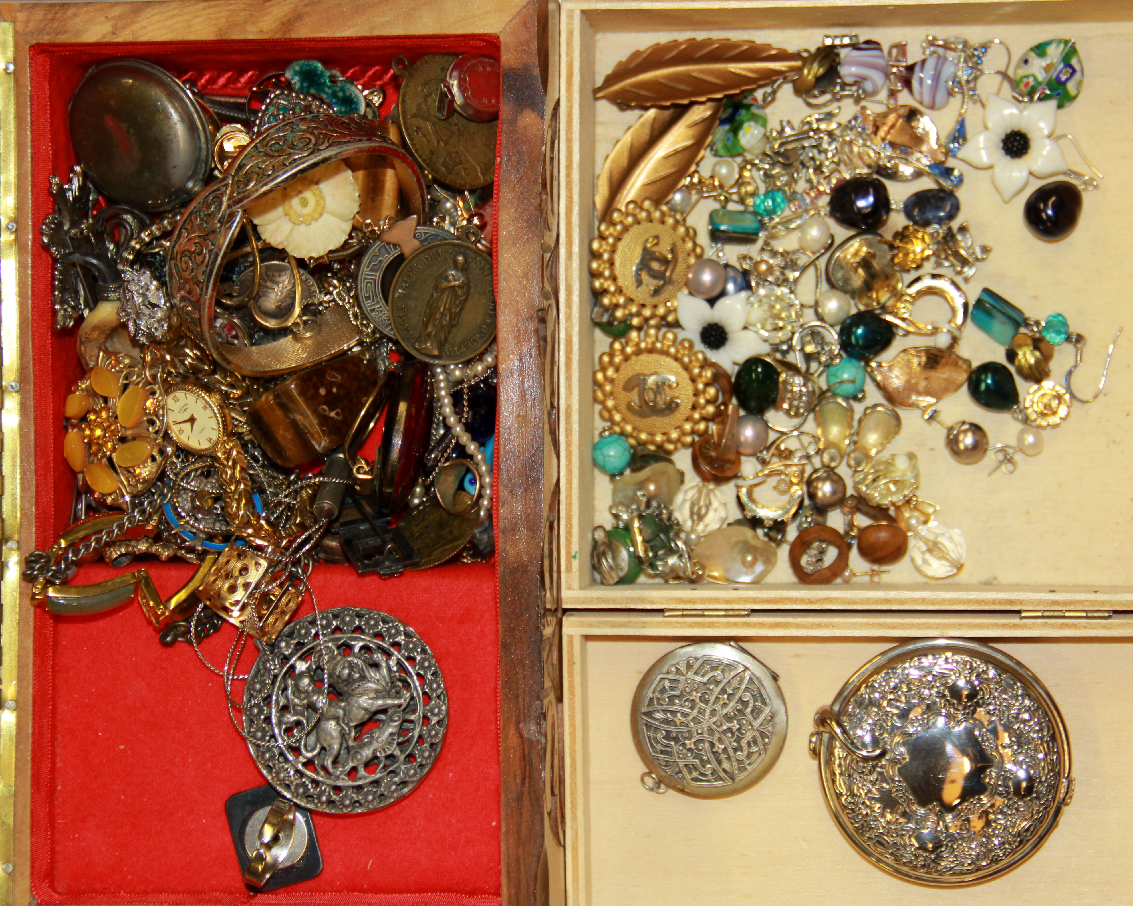 Two boxes of costume jewellery.