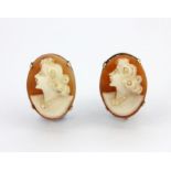 A pair of 9ct yellow gold (stamped 9ct) cameo set earrings.