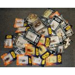 A group of boxed Star Wars collector's figures.