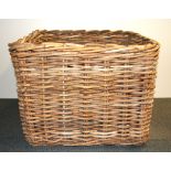 A large cane laundry basket, size 73 x 73 x 57cm.