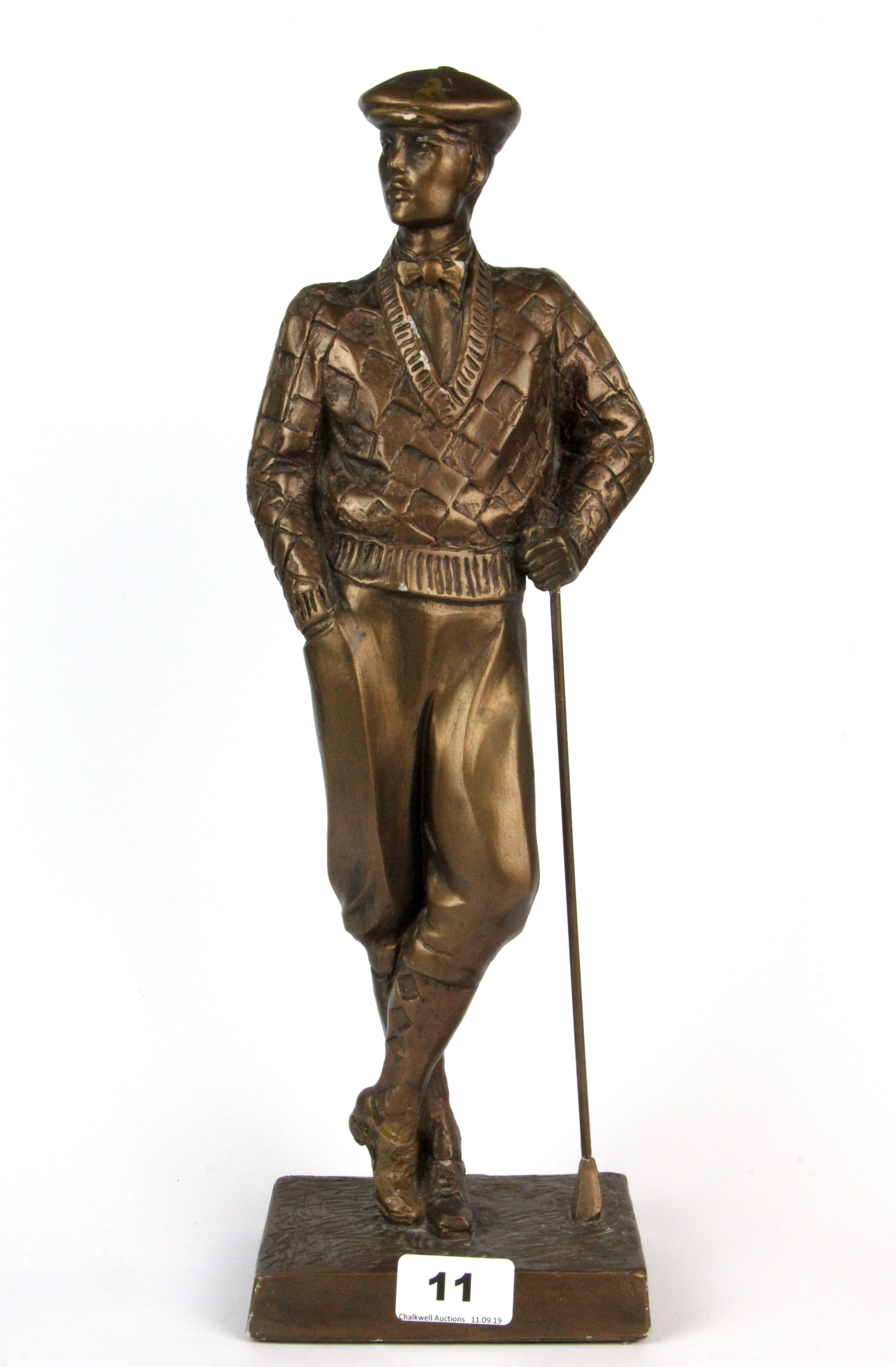 A cold cast figure of a golfer, H. 41cm.