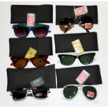 Five pairs of ex-shop display Ray-Ban sunglasses and one pair of Oakley.