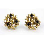 A pair of 9ct yellow gold sapphire set stud earrings, L. 1.3cm.