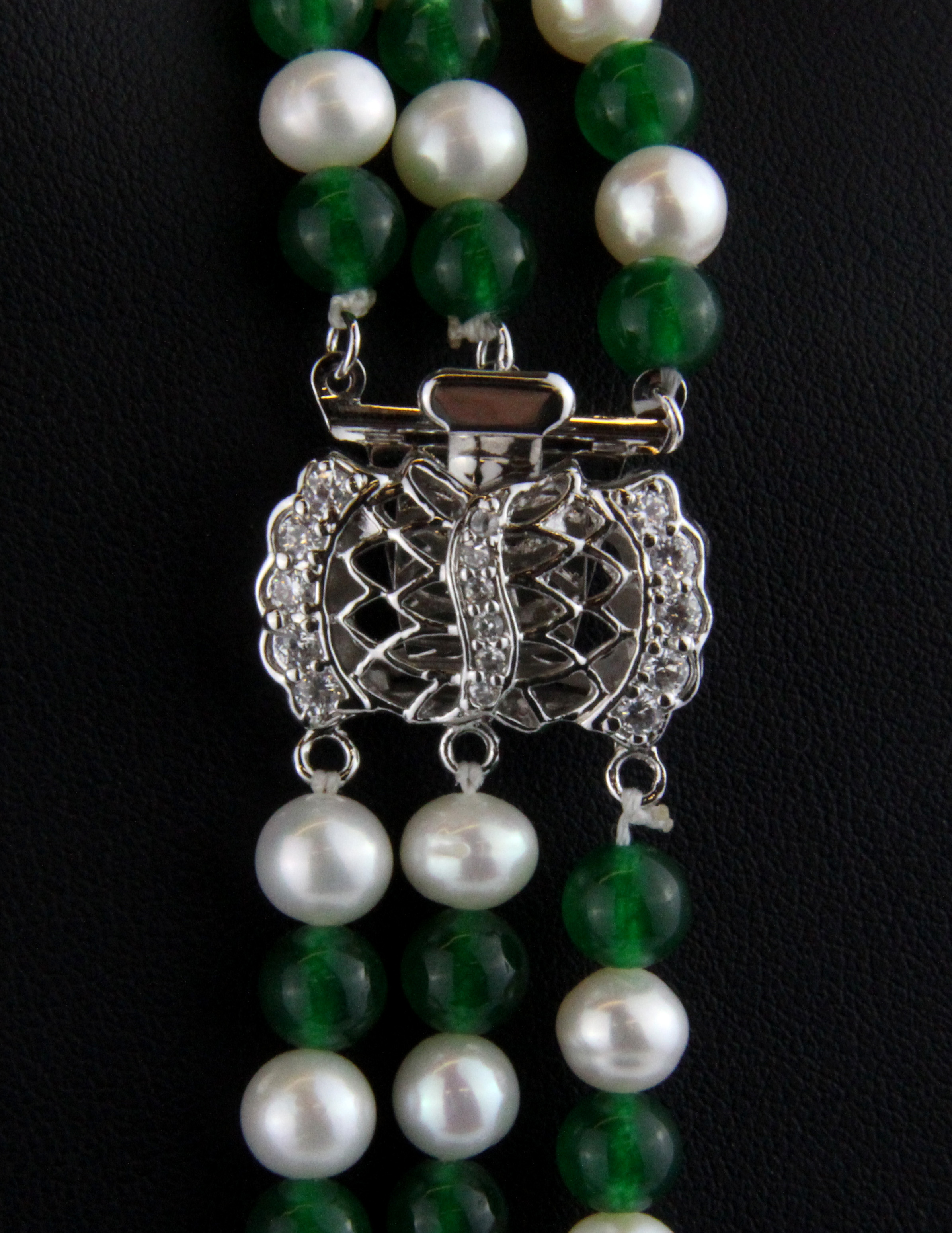 A three row jade and cultured pearl necklace on a white metal clasp. - Image 2 of 2