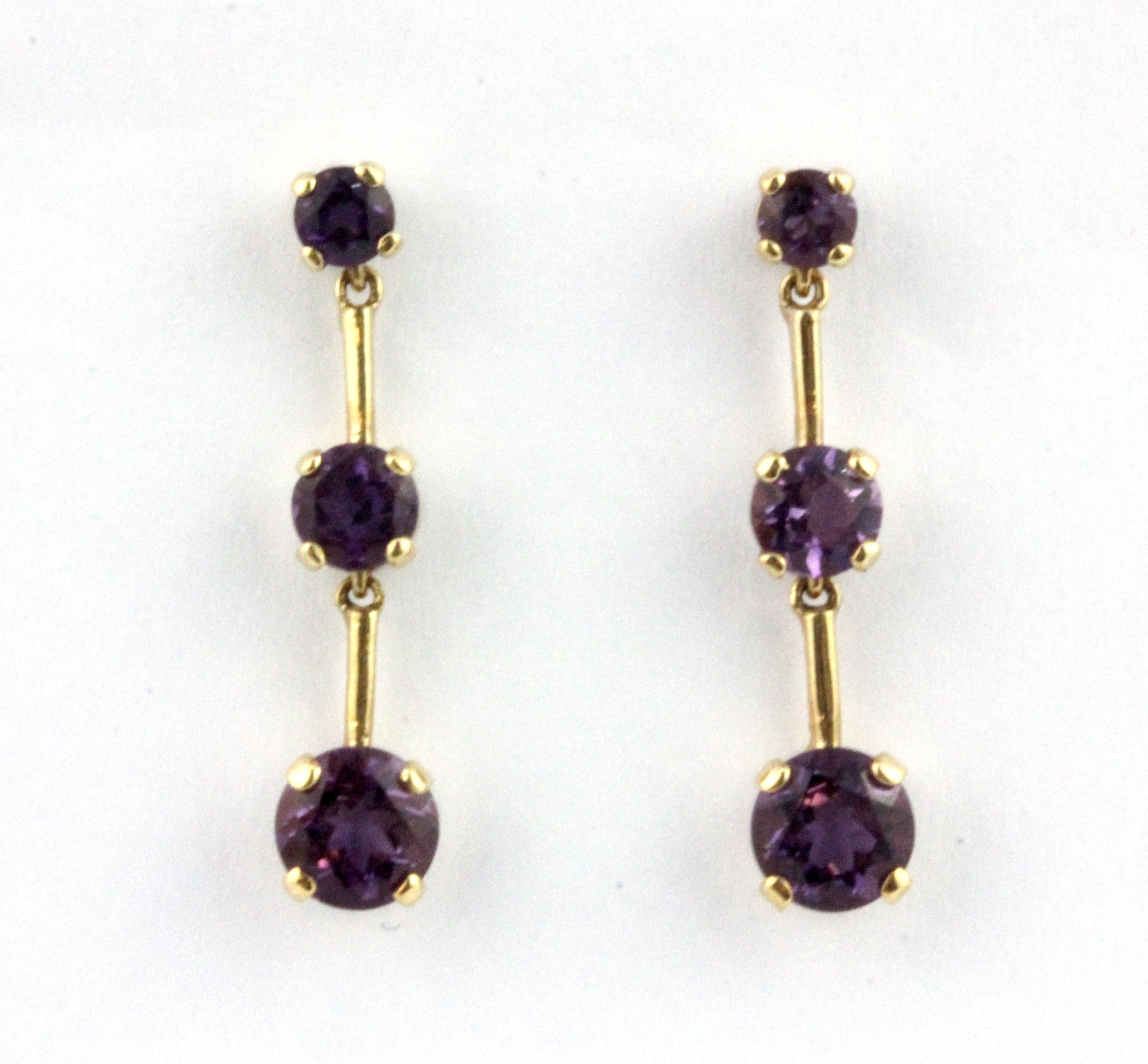 A pair of 9ct yellow gold (stamped 10k) amethyst set drop earrings, L. 2.5cm.