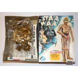 A 1977 Star Wars C-3PO plastic model unmade in box.