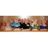 A group of Wade Nat West pig money boxes.