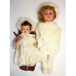 Two antique composition dolls, largest 60 cm.