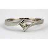 A 9ct white gold solitaire ring set with a princess cut diamond (approx. 0.25ct), (P).