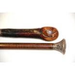 A hallmarked silver topped walking cane and a silver banded sword stick, longest L. 93cm.