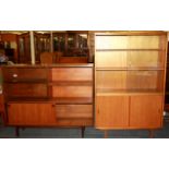 Two 1970's teak bookcases by Herbert E Gibbs Limited, sizes 122 x 101, 143 x 91cm.