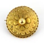 A yellow metal (tested high carat gold) mourning brooch, Dia. 2cm.