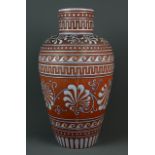 A 19th Century enamelled terracotta vase, H. 38cm.