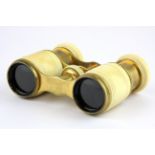 A pair of 19th Century turned ivory and gilt metal opera glasses.