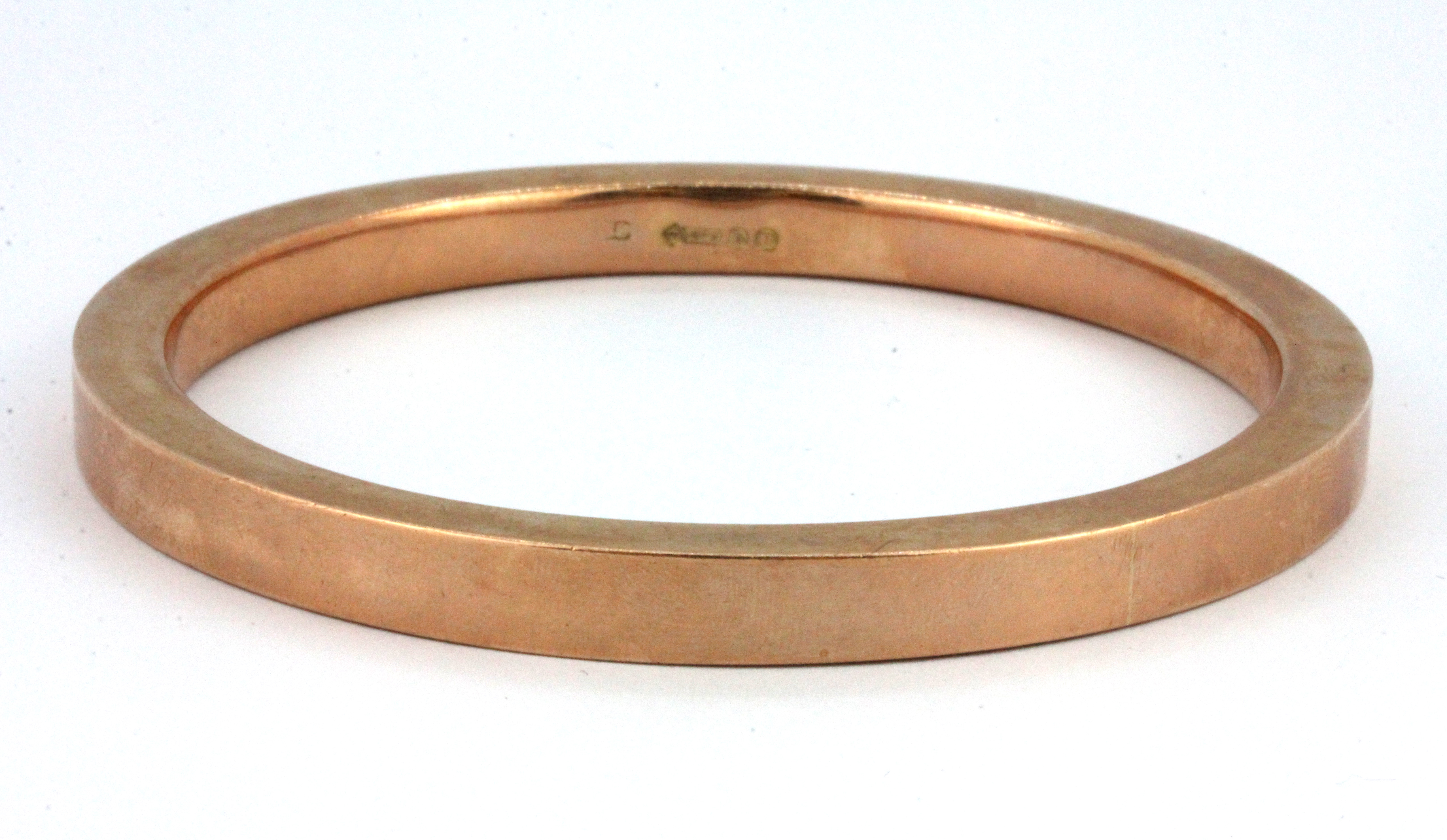 A 9ct rose gold bangle, Dia. 7cm, W. 20.4g.