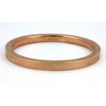 A 9ct rose gold bangle, Dia. 7cm, W. 20.4g.