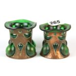 A very fine pair of Arts and Crafts hammered copper and glass Cobral ware vases, additional makers