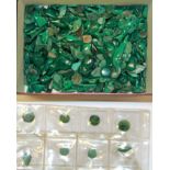 A large quantity of polished malachite.