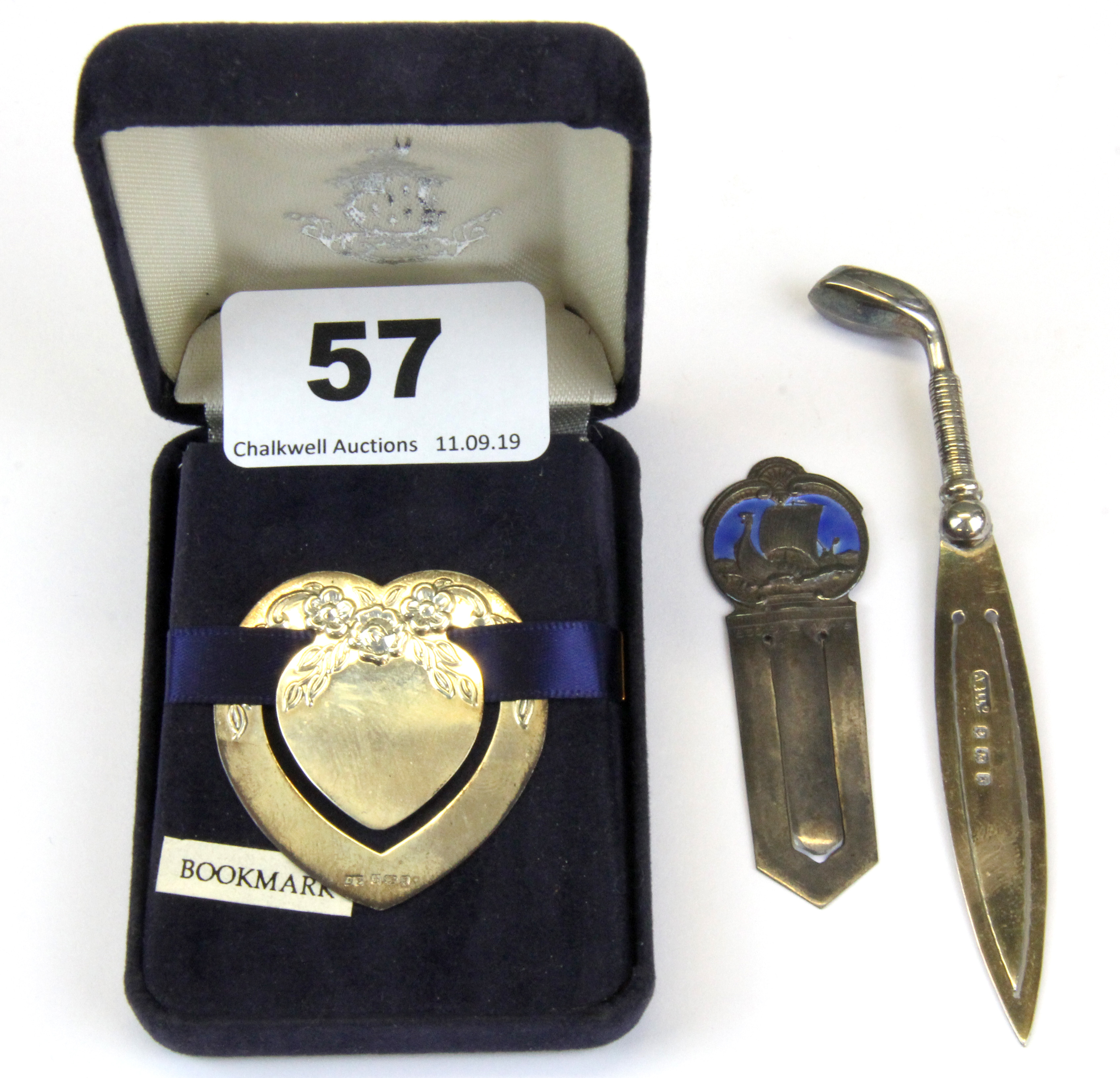 A Norwegian enamelled 830 silver bookmark with silver golf club and silver heart bookmarks.