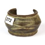 An early bronze slave bangle, W. 12cm.