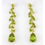 A pair of 925 silver gilt drop earrings set with marquise and pear cut peridots, L. 4.4cm.