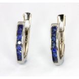 A pair of 925 silver earrings set with round cut sapphires, L. 1.4cm.