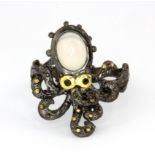 A Hana Maae designer 925 silver gilt octopus shaped ring set with opal and sapphire set eyes, (Q).